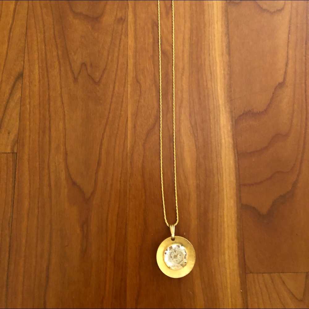 Pendant watch on gold chain
